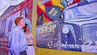 See the murals and learn about Belfast's troubled past on a private taxi tour