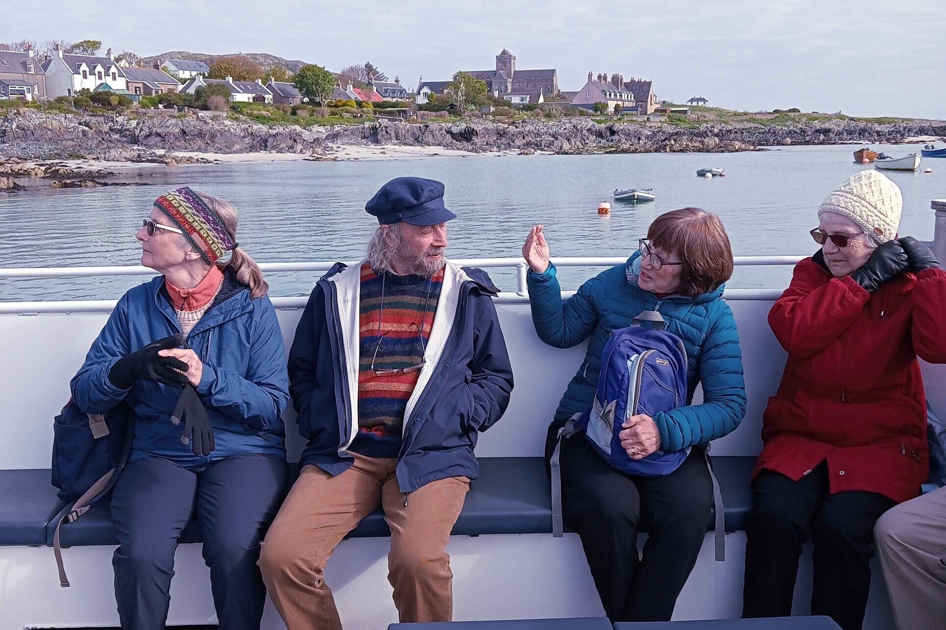 A McKinlay Kidd tour group travelling on a ferry to the Isle of Iona