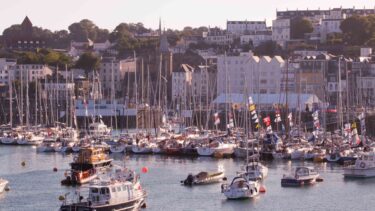 Boats anchored at the St Peter sea front., Guernsey
