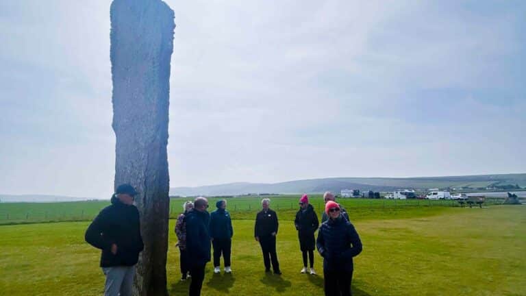 A McKinlay Kidd group at standing stones of Stenness on Orkney