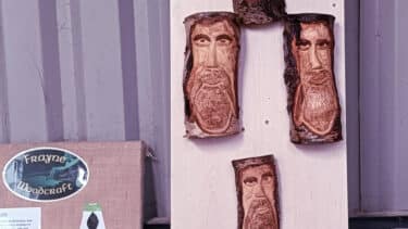 Unusual carved wooden faces in a carpenters workshop in Co. Meath, Ireland