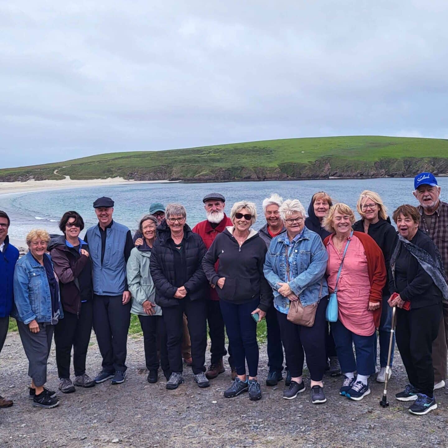 A McKinlay Kidd tour group at St Ninian's beach in Shetland