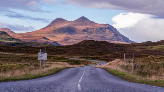 Road to Ullapool with mountains in the background