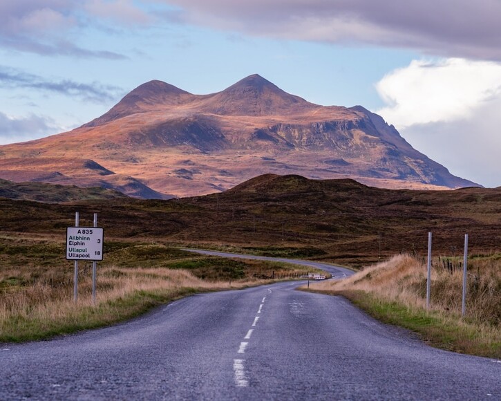 Road to Ullapool with mountains in the background